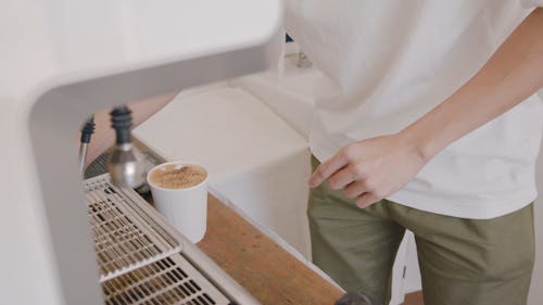 Making Coffee On A Disposable Paper Cup