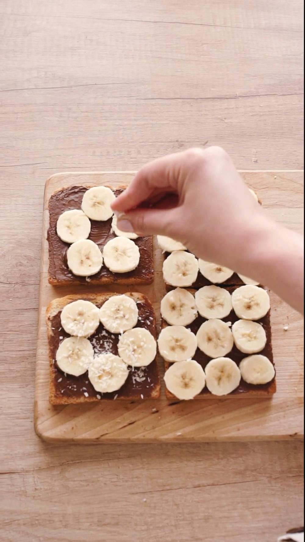 a-person-spreading-chocolate-butter-on-the-bread-free-stock-video