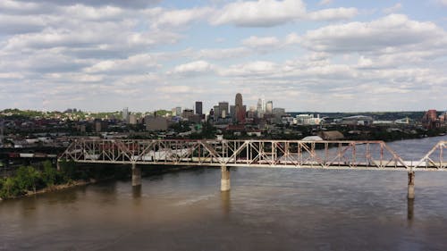 A Drone Shot of a Steel Bridge Over the River