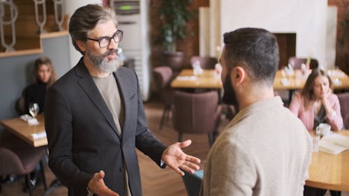 Two Businessmen Shake Their Hand In Agreement