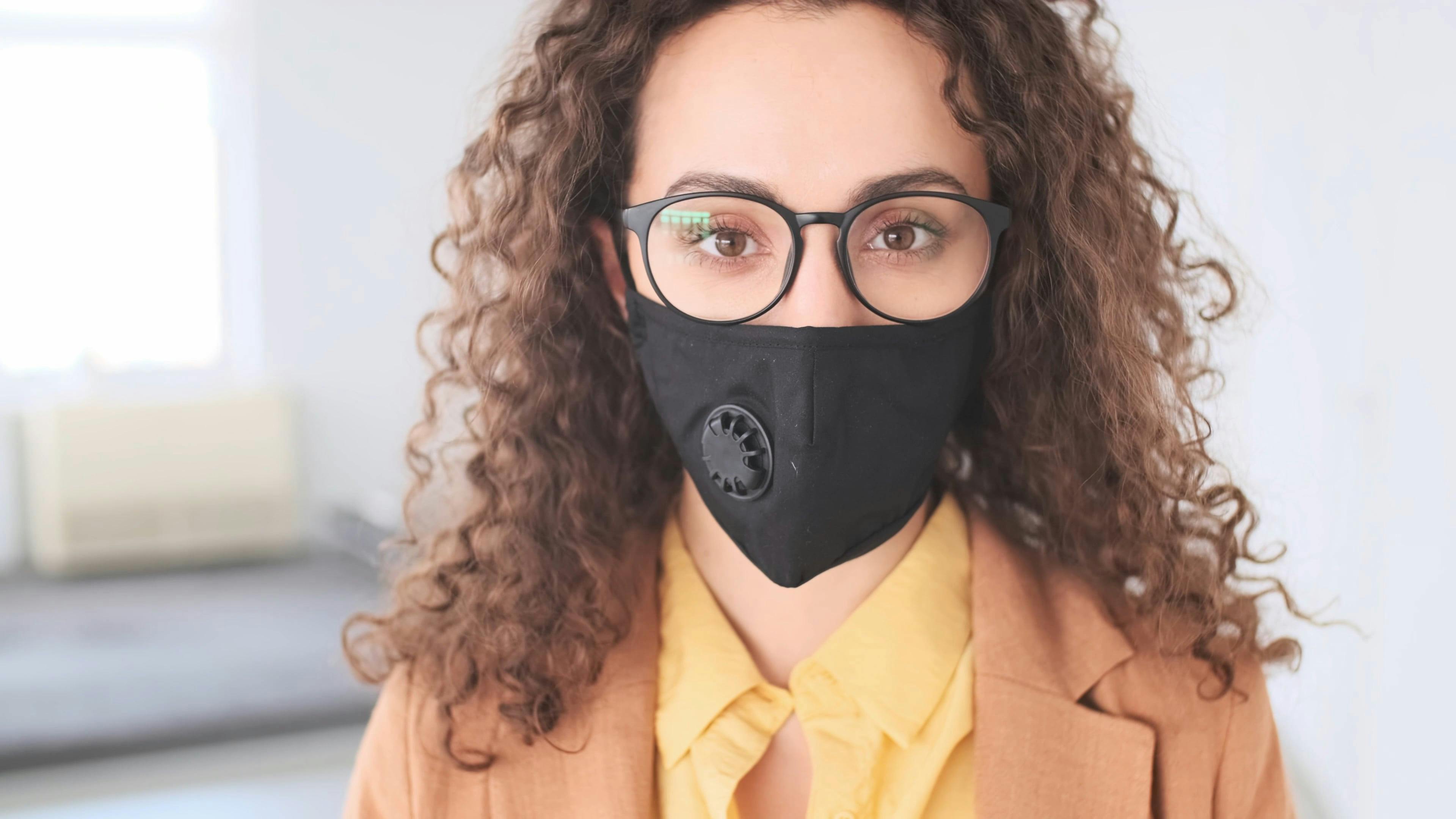 Woman Wearing Black Face Mask with Valve Free Stock Video Footage, RoyaltyFree 4K & HD Video Clip