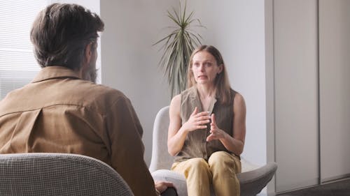 Man and Woman Discussing Some Issues