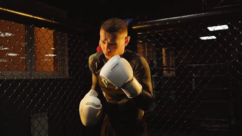 A Young Boxer Doing Shadow Boxing In The Gym