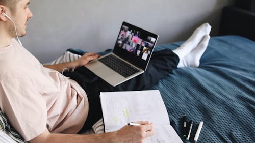 A Man Engaged in a Video Call