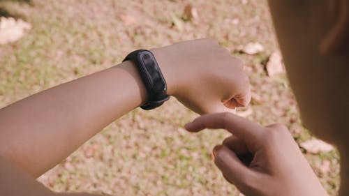 Person Checking His Smartwatch