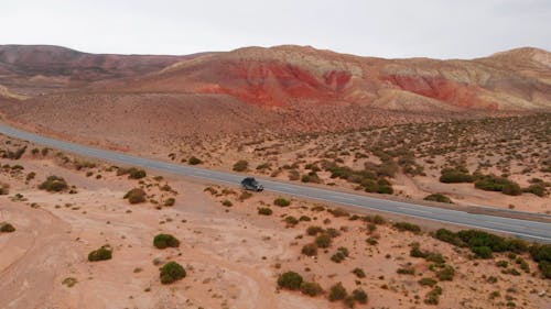 Aerial Footage of a Vehicle Driving on Roadway