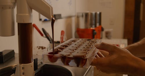 Pouring Chocolate in Chocolate Mold