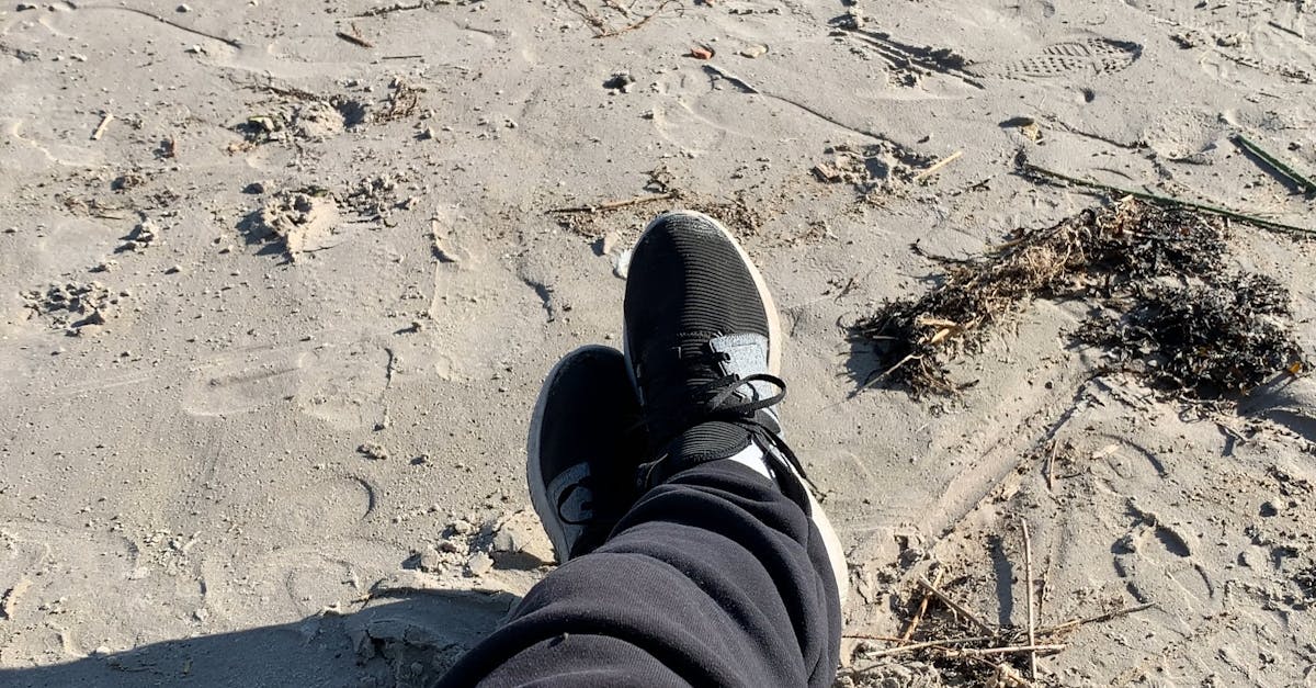 A Person Sitting On The Beach Sand Free Stock Video Footage, Royalty
