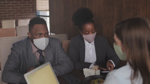 People Wearing Face Mask During Meeting