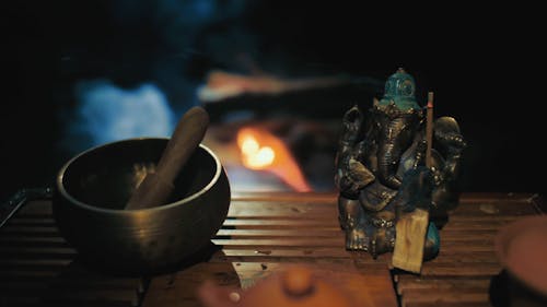 Tibetan Singing Bowl Near Ganesha Statue