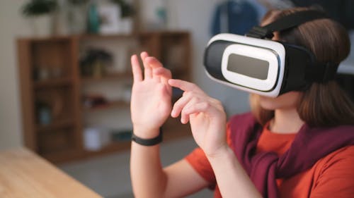 A Girl Playing Wearing The Virtual Reality Game Head Set