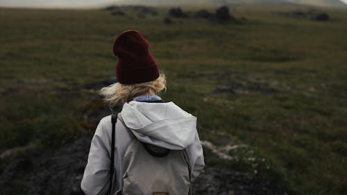 A Woman Photographer Enjoying The View In Nature