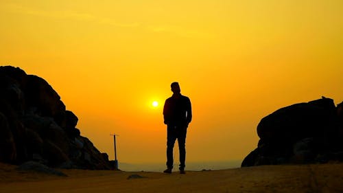 Silhouette of a Man Walking