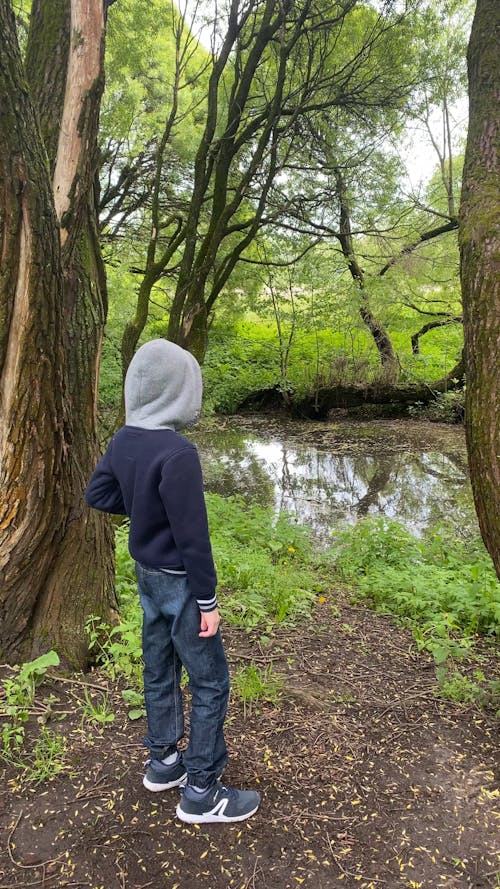 Boy Looking at the River