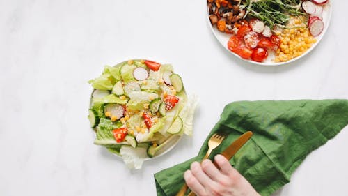 Person Eating Salad