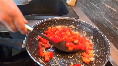 Man Cooking Tomatoes