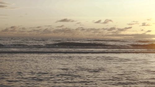 Waves Breaking By The Seashore