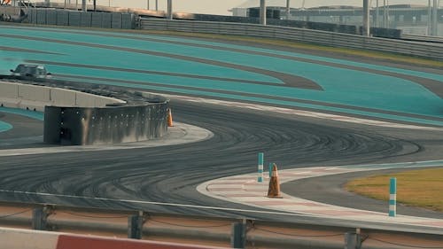 A Car Drifting in Asphalt Road