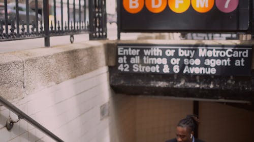 Man Coming Out From A Subway Station