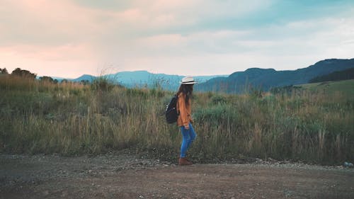 A Woman Walking in the Countryside 
