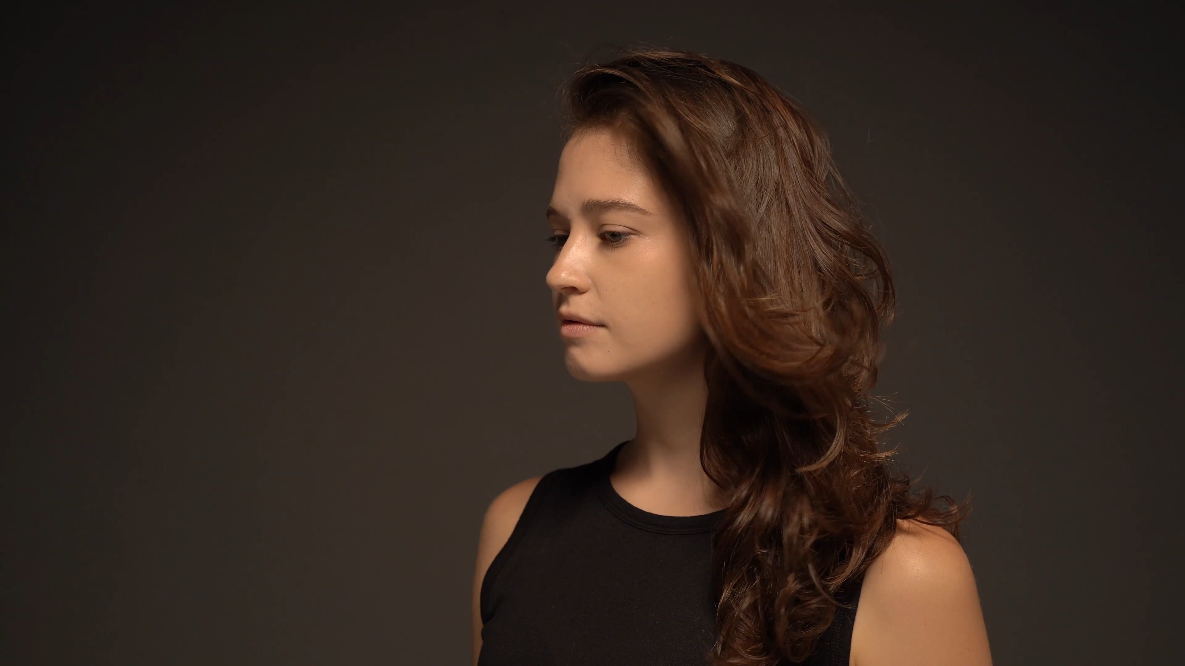 A Woman with Her Hair Flying in the Wind Free Stock Video Footage ...