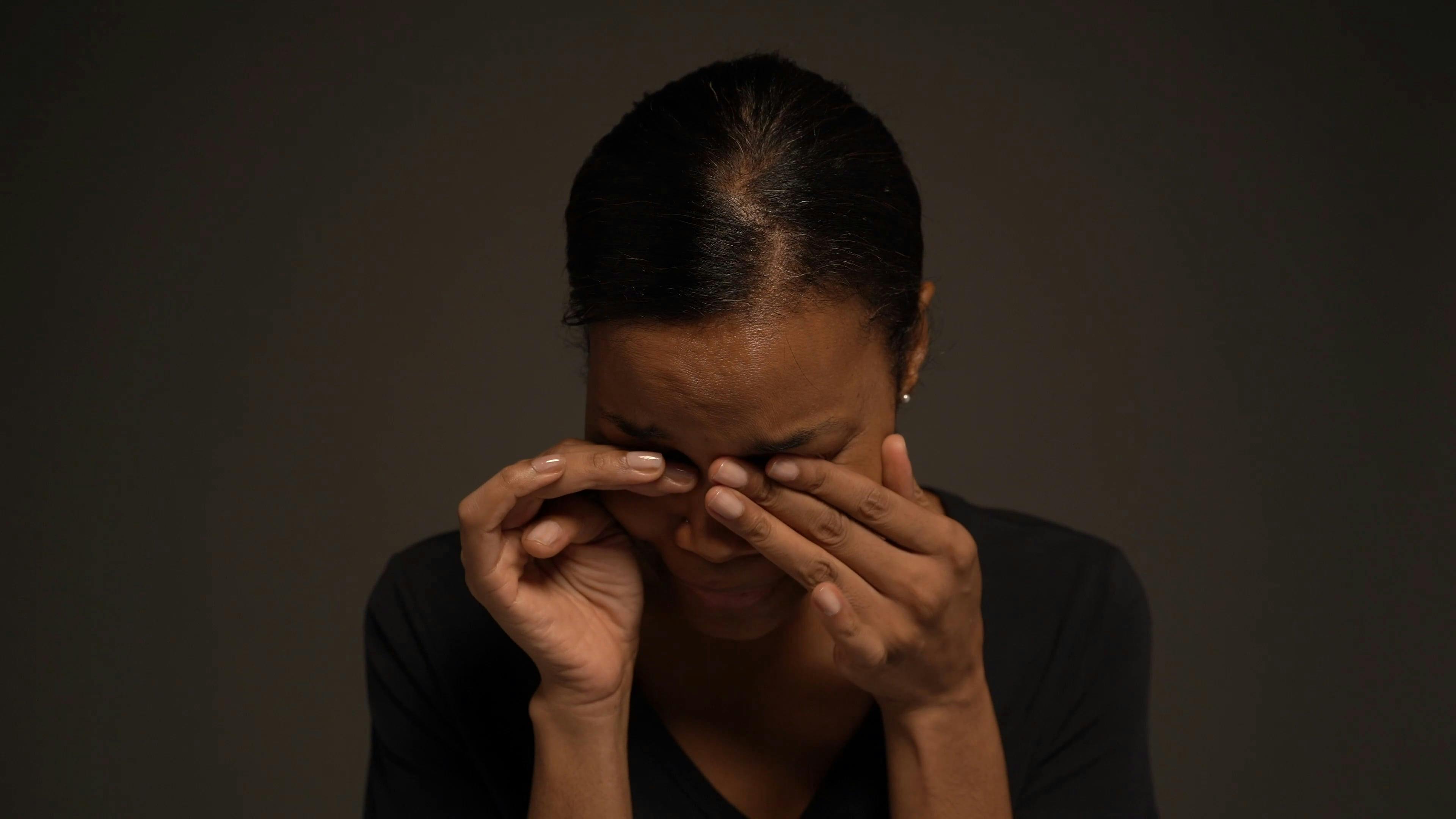 A Woman Crying and Wiping Her Tears · Free Stock Video