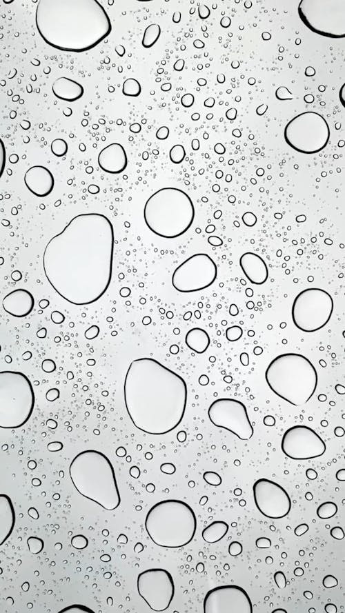 Water Droplets Forming a Pattern on a Surface