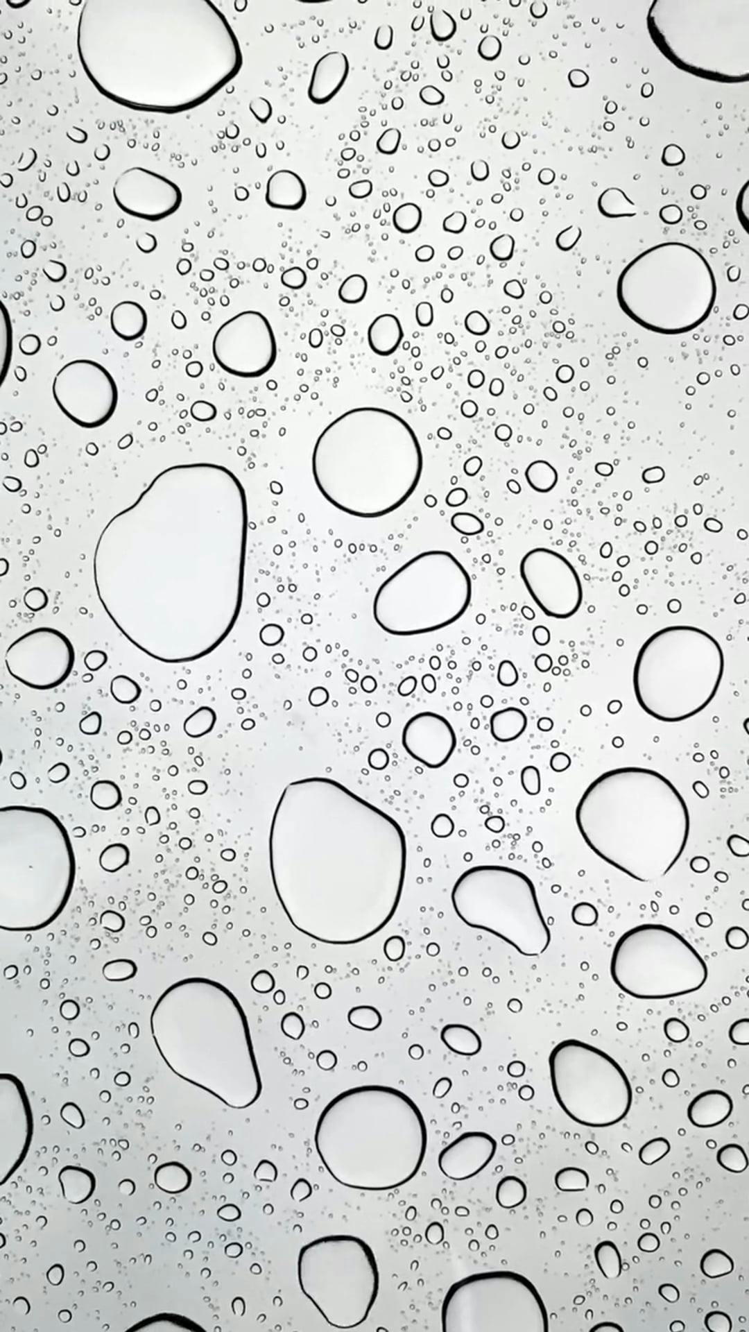 Water Droplets Forming a Pattern on a Surface · Free Stock Video