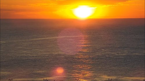 A Video Footage of a Moving Boat on a Golden Hour