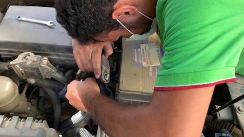 Man Changing Car Battery