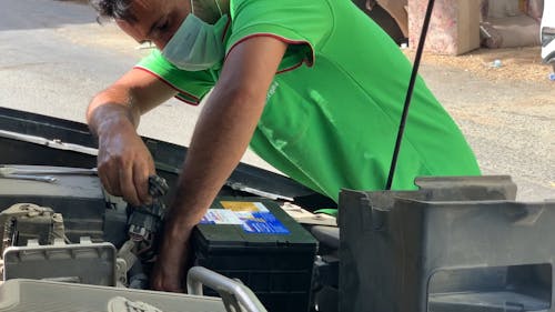Man Changing Car Battery