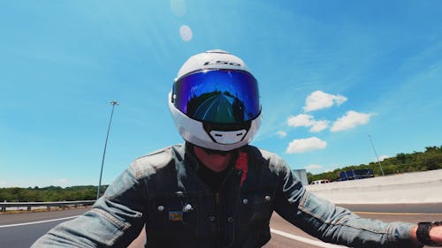 Man On A Motorbike At High Speed