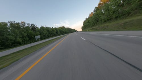 Vehicle Traveling On Highway In Timelapse Mode