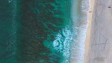 waves rushing to shore