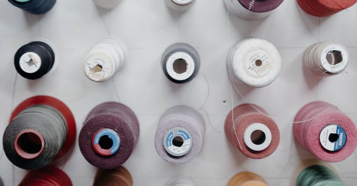 A wall of spools of thread hanging on a wall Free Stock Video Footage ...