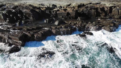 Waves Crashing On Rocks 