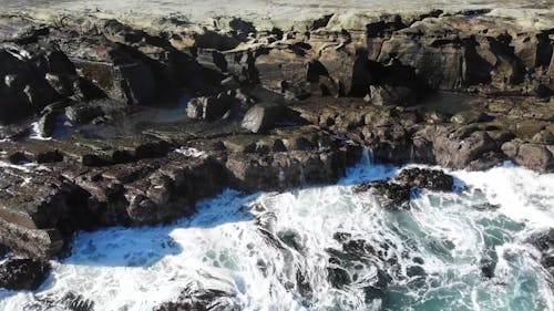 Waves Crashing On A Rocky Coast