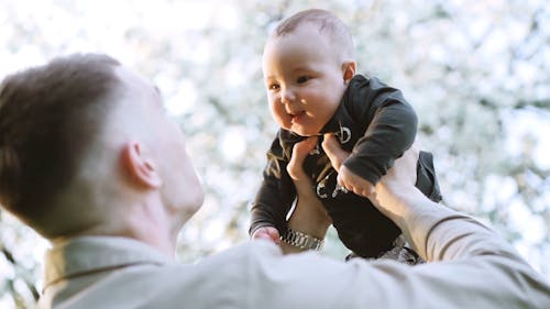 Father And Child Having Happy Moments