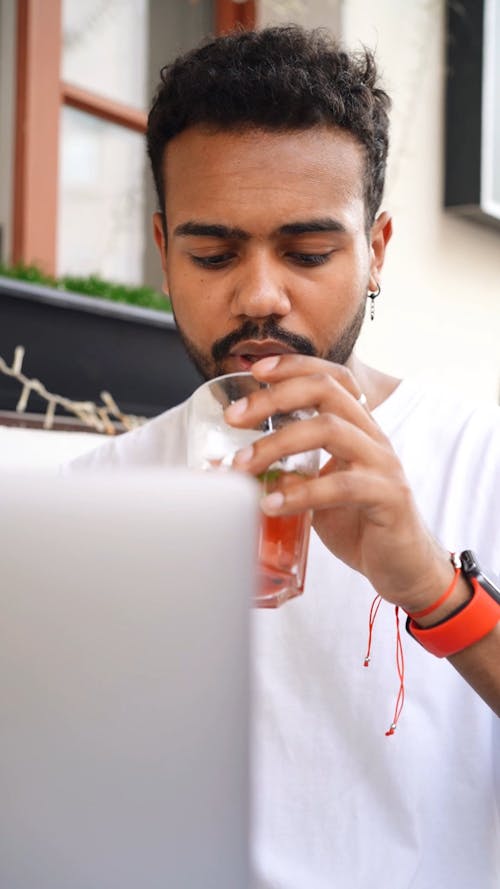 Video Of Man Sipping Juice