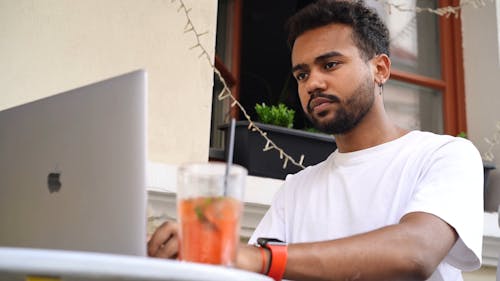 Close-Up Video Of Man Using Laptop