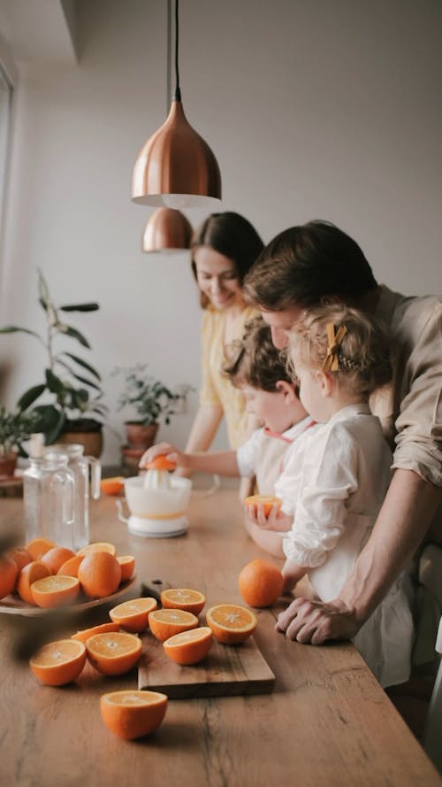 A Family Making Orange Juice Together