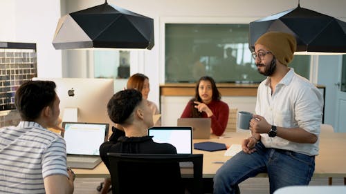 A Team Discussing Ideas in the Meeting Room