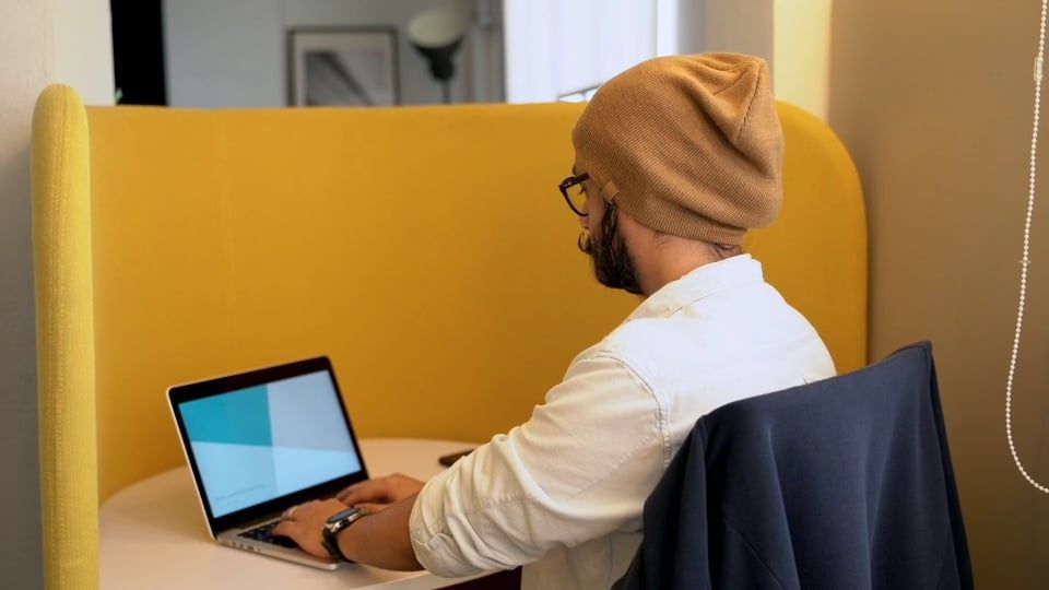 A Man Working in a Cubicle · Free Stock Video