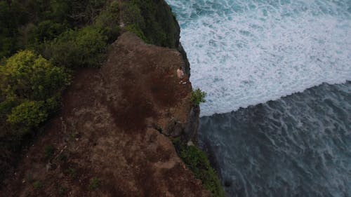 Video Of Man Standing On Cliff Edge