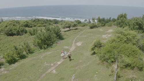 Video Of Man Holding Surfboard