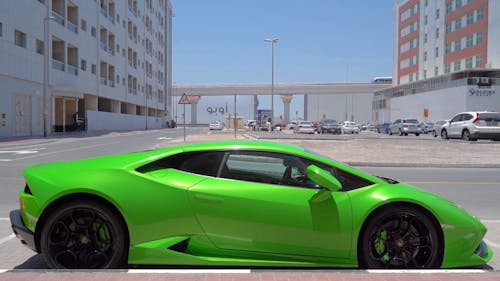 Green Sports Car Parked In An Open Lot