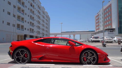 Red Sports Car Parked In An Open Lot