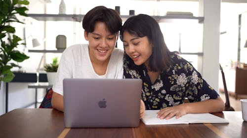 Couple Working Together at the Table