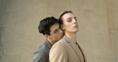 Young Men Wearing Blazers and Posing Together