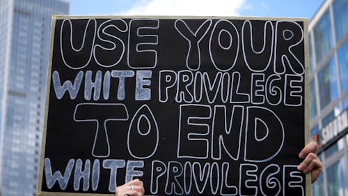 A Person Holding a Placard